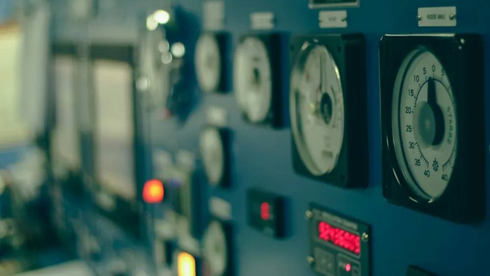 Close-up of an industrial control panel showing precision wiring